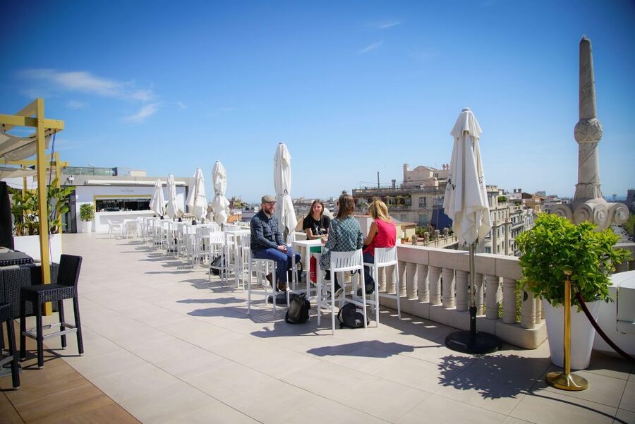 Gaudi UNESCO Highlights - 4h Small Group Bike Tour - Passeig de Gracia presents two very different mansions