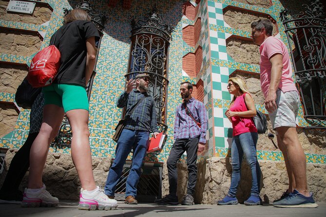 Gaudi UNESCO Highlights Small Group Bike Tour - Plaça Reial: Gaudi details in a lively square