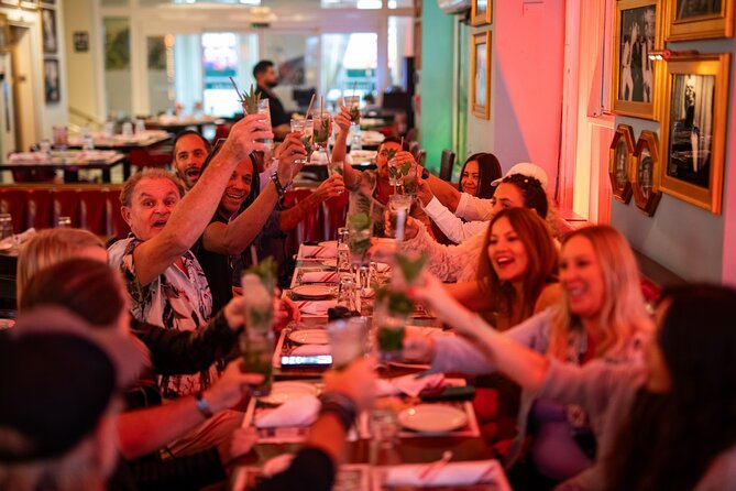 South Beach Food & Fun Art Deco Miami Food Tour - The middle of the walk: drinks, an empanada, and local stories