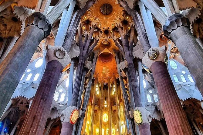 Wonders of Gaudi: Park Guell & Sagrada Familia Private Tour - Park Güell: mosaics, stonework, and Barcelona views